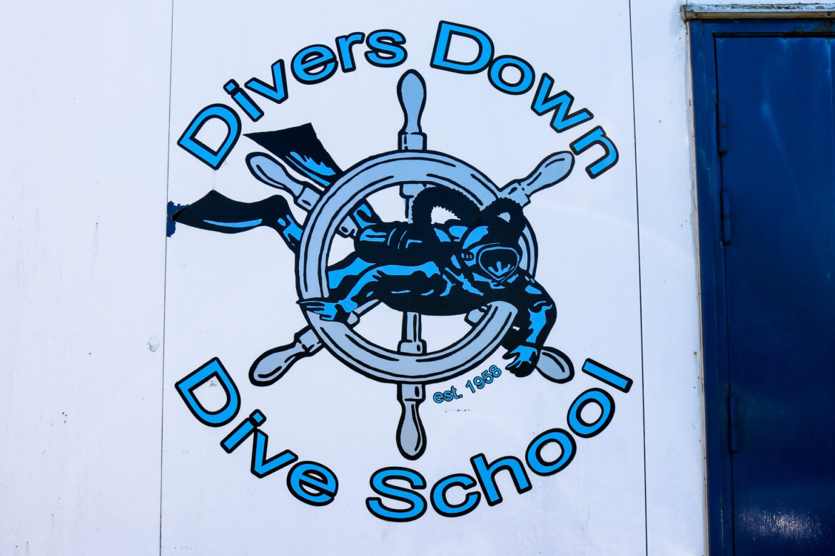Dive school signage on Swanage Pier