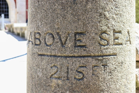 215 ft above sea sign carved into stone pillar at Durlston Castle