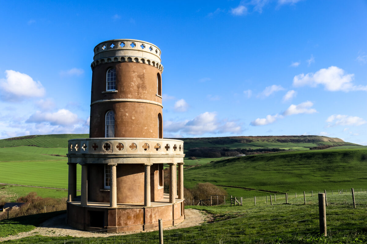 Clavell Tower in Kimmeridge with hills and farmland behind
