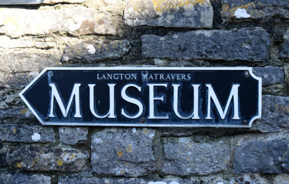 Sign for Langton Museum on the wall of St George's Close