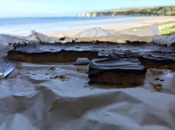 Chocolate Brownie with Old Harry Rocks in the background on South Beach Studland