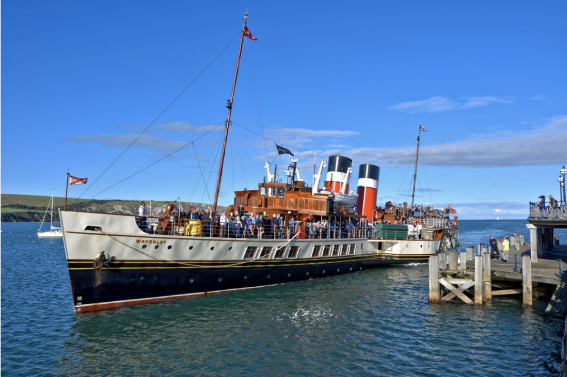 Paddle steamer, the Waverley, docking at Swanage Pier