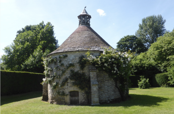 The Athelhampton dovecote with climbing flowers