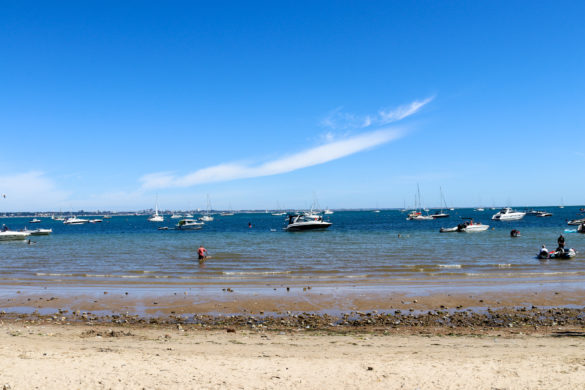 Boats in the sea at Studland's South Beach