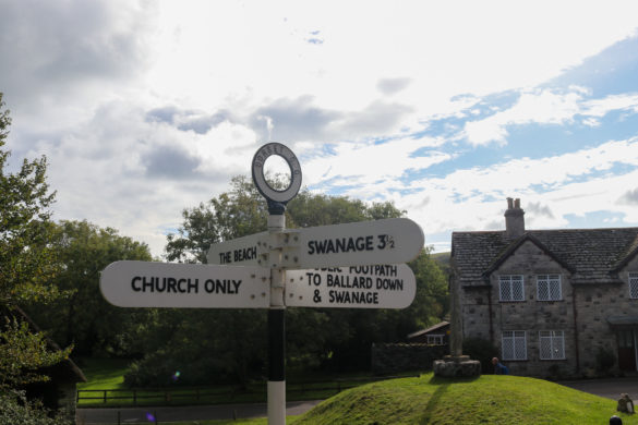 Studland signage for its church, Swanage and Ballard Down