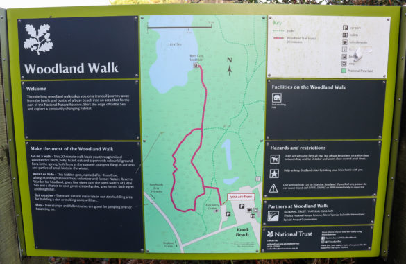 Walking route information board for Knoll Beach in Studland
