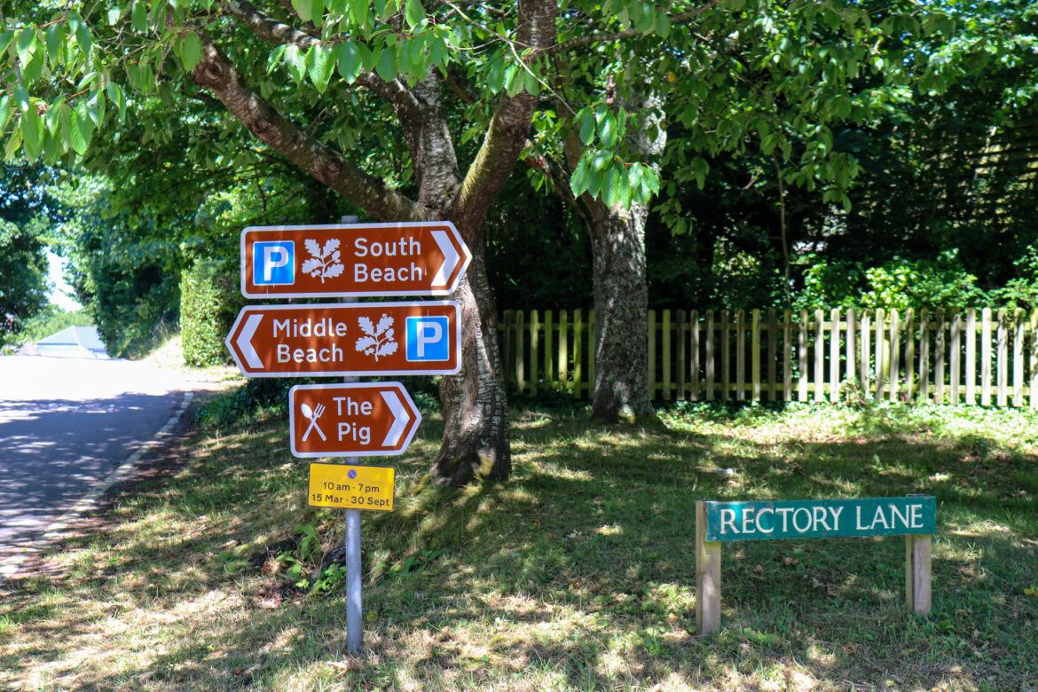 Signs for the beach on Rectory Lane in Studland