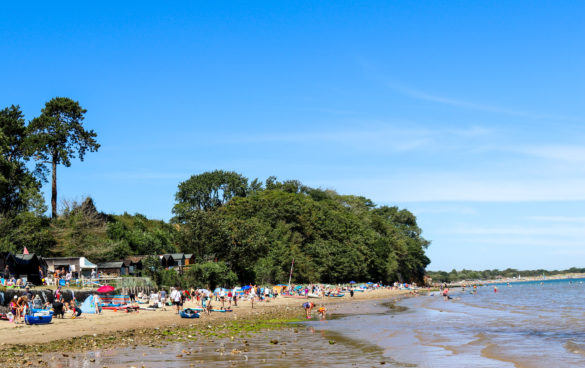 People on South Beach, Studland in summer