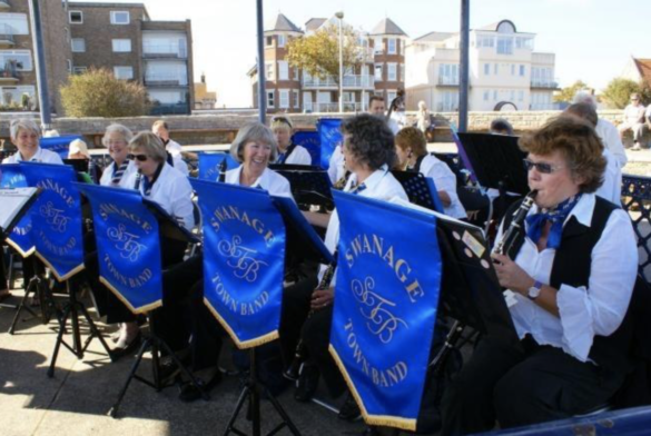 Ladies of the Swanage Town Band playing clarinets