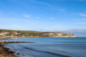 Swanage Beach groynes and Purbeck Hills in the distance