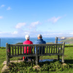 Couple sitting on a bench at Swyre Head
