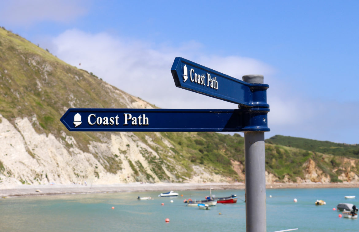 Lulworth Cove coast path signs