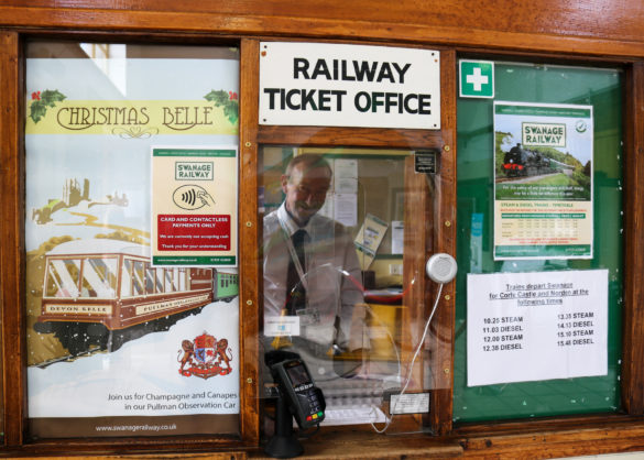 Volunteer manning the Swanage Railway ticket office