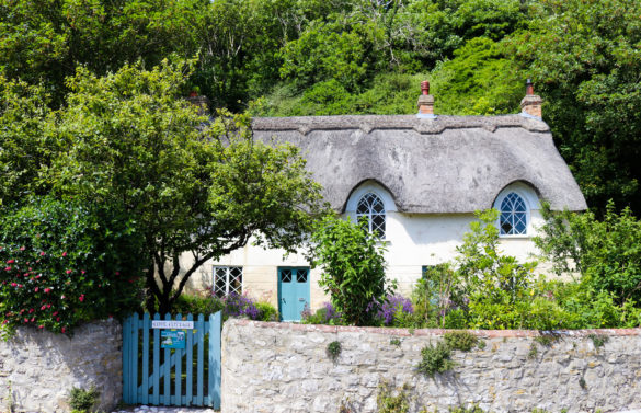 Thatched cottage with blue gate in West Lulworth