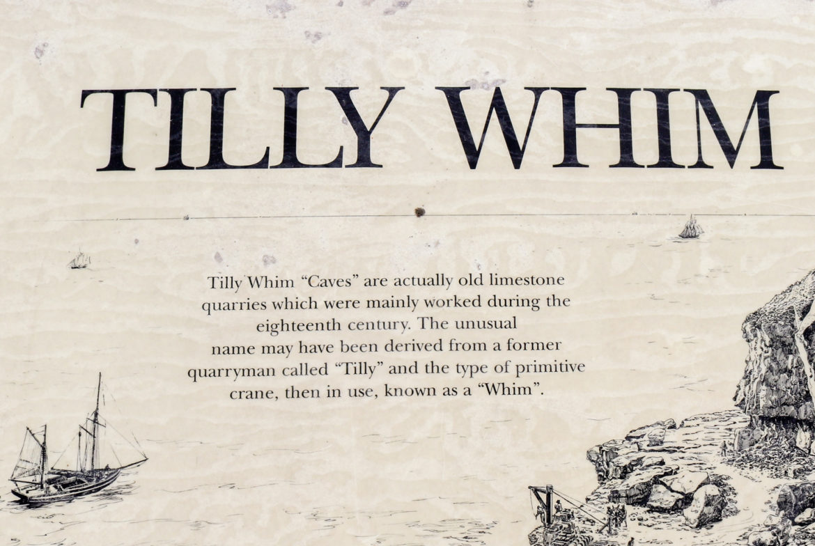 Information point showing history of Tilly Whim Caves name