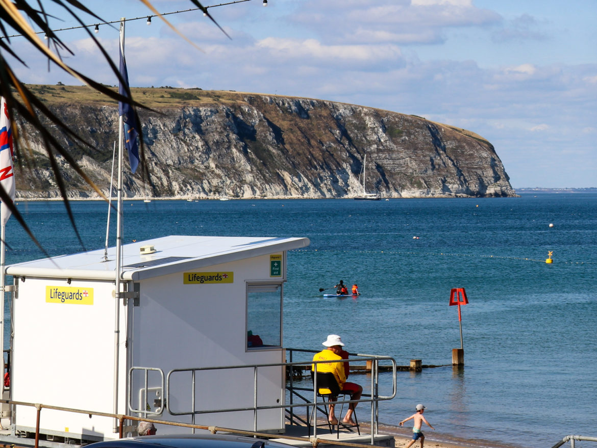 Lifeguard and safe safe swimming area at Swanage beach