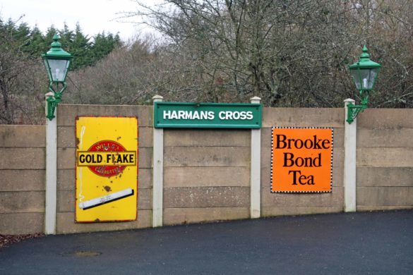 Retro advertisements and signage at Harman's Cross station