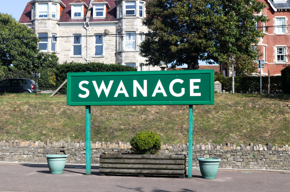 Swanage Railway station sign on platform
