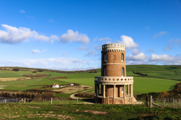 Clavell Tower with farmland and blue sky behind