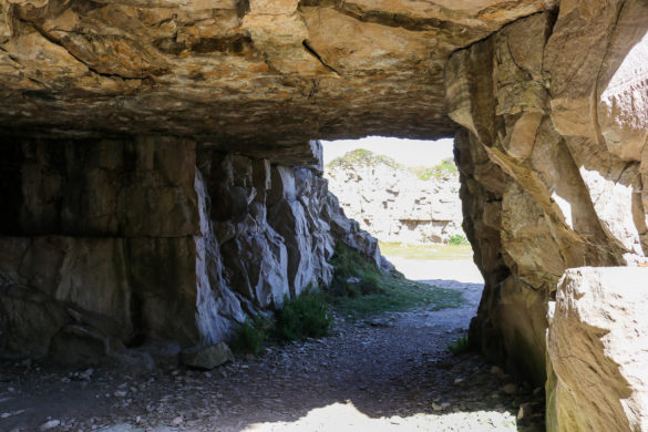 Underneath arch of rock at Winspit quarry