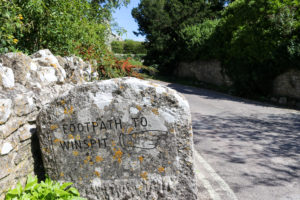 Footpath to Winspit stone sign in Worth Matravers
