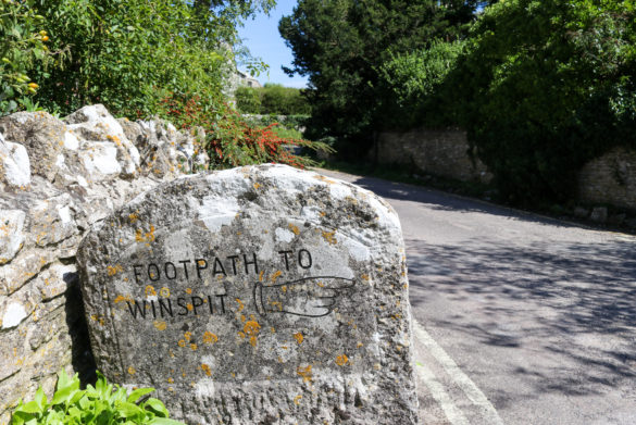 Footpath to Winspit stone sign in Worth Matravers