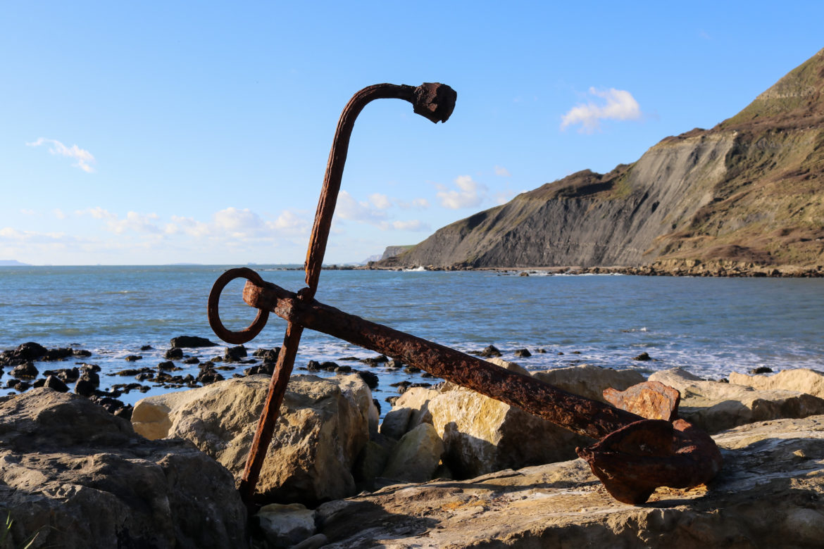 Rusty anchor on the rocks at Chapman's Pool