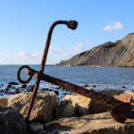 Rusty anchor on the rocks at Chapman's Pool