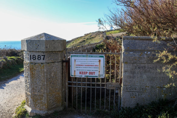 Tilly Whim Caves entrance warning sign at Durlston