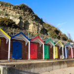 Colourful beach huts along North Beach in Swanage