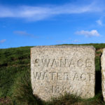 Swanage obelisk water act stone inscription on stone set into the grass