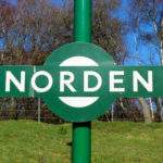 Green and white sign for Norden railway station near Corfe Castle