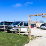 Cars in the village car park at Worth Matravers
