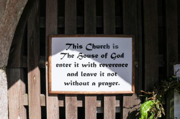 Sign on the door of St Nicholas' Church in Arne