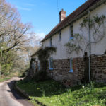 House toward the end of the main road in Arne village