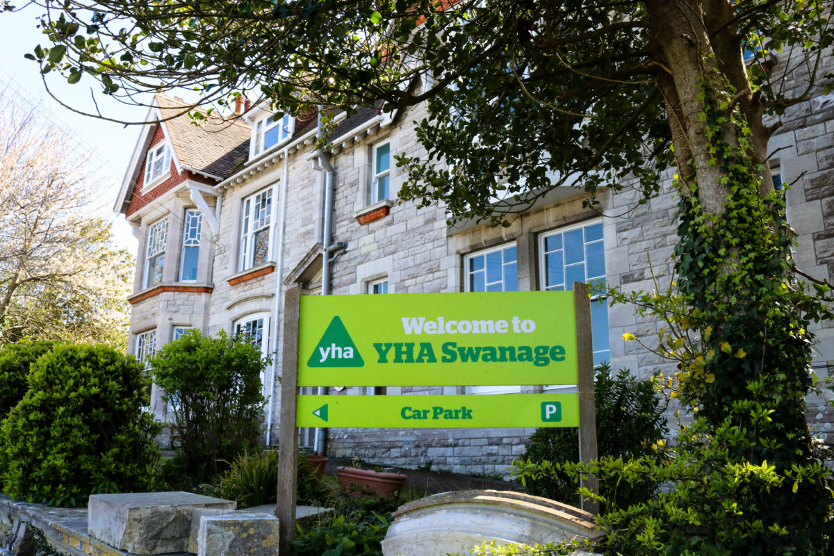 Welcome sign outside the Swanage Youth Hostel Association building