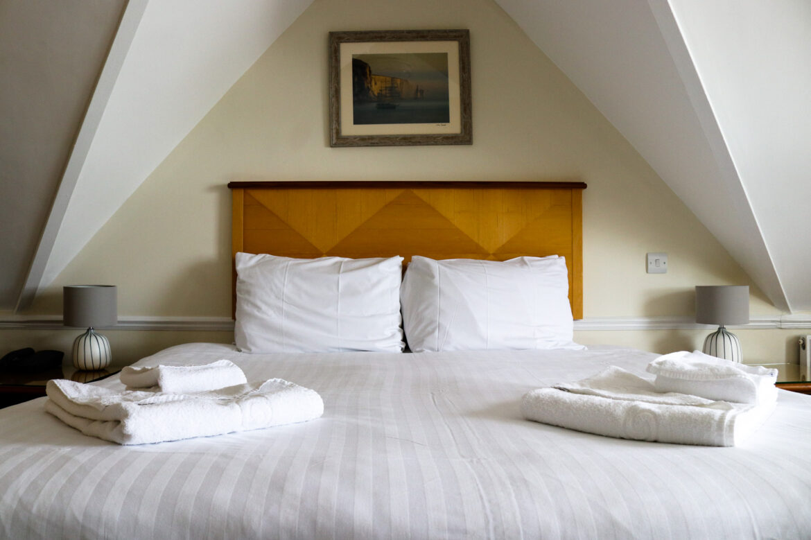 Bed under the eaves on the top floor of Swanage's Grand Hotel