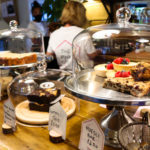 Cakes displayed on the counter of the Pink Goat in Corfe Castle