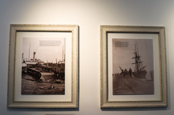 Historic pier pictures framed on wall of Swanage Pier café