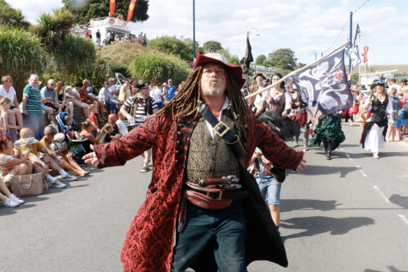 People in pirate fancy dress at the Swanage Carnival parade