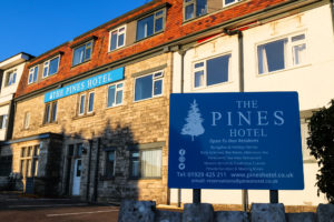 'Open to non-residents' sign at the front of The Pines Hotel, Swanage