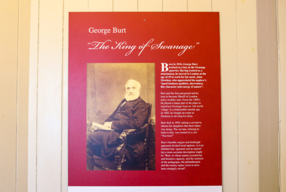 Information board about George Burt on wall of Durlston Castle's café