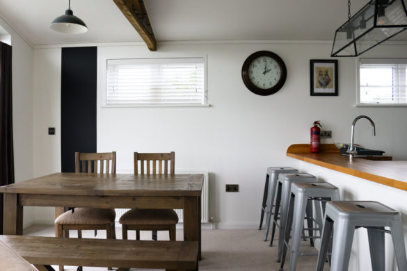 Dining area in one of the holiday lodges at Swanage Coastal Park