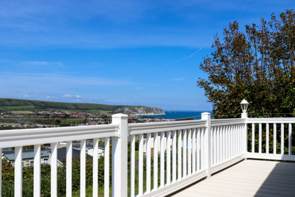Decking and railing of a Swanage Coastal Park holiday home balcony