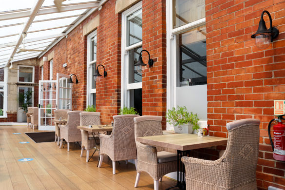 Rattan chairs in conservatory of the Swanage Grand Hotel