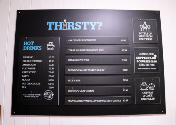 Hot & cold drinks menu board at Swanage Hostel
