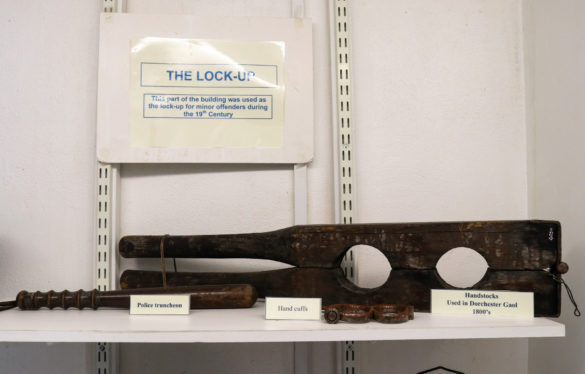 19th Century handcuffs and hand stocks on display at the Corfe Castle Museum