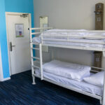 Bunk beds in a family, ensuite room at Swanage youth hostel