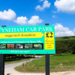 Car parking £2 donation sign in Tyneham, Purbeck