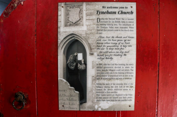 Welcome message and history behind message on the door of Tyneham Church
